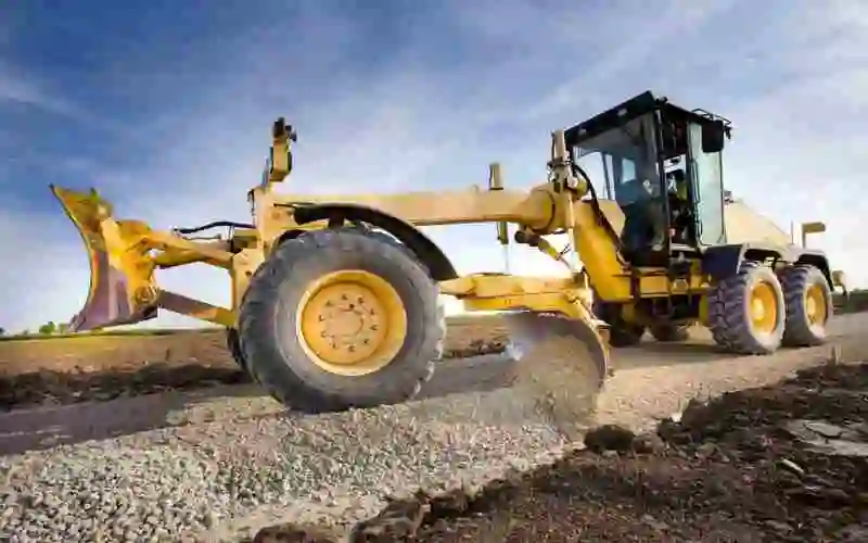 Motorgrader til planering og profilering af terræn